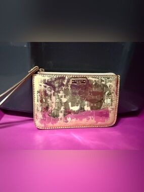 kate spade Metallic Gold and Pink Embossed Bow Wristlet